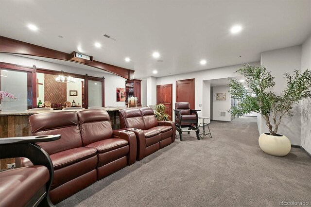 1287 Buffalo Ridge Rd, Castle Pines, CO 80108 - cinema room featuring light carpet, recessed lighting, a barn door, and bar area