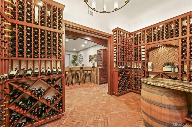 1287 Buffalo Ridge Rd, Castle Pines, CO 80108 - wine cellar featuring brick patterned floors
