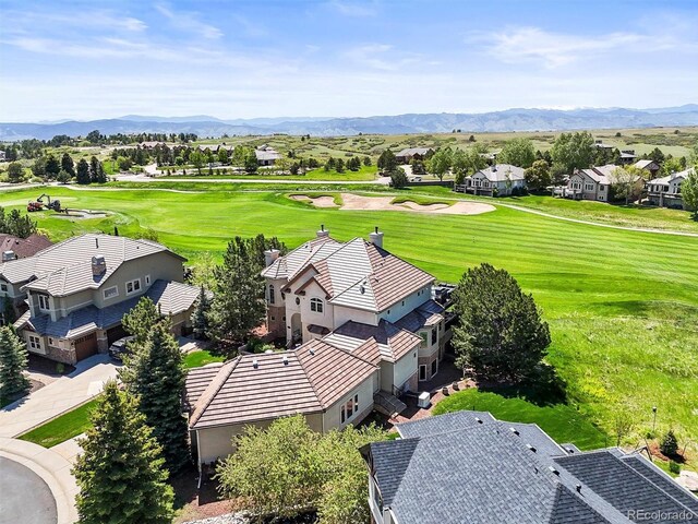 1287 Buffalo Ridge Rd, Castle Pines, CO 80108 - aerial view of residential area with a mountain backdrop and a golf course