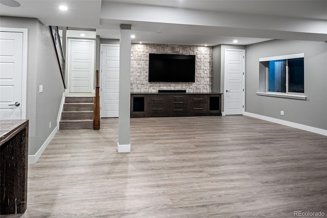 3439 Uinta St, Denver, CO 80238 - unfurnished living room with baseboards, light wood finished floors, stairway, and recessed lighting
