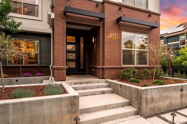 3439 Uinta St, Denver, CO 80238 - property entrance with brick siding