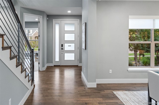 3439 Uinta St, Denver, CO 80238 - foyer with dark wood-style flooring, stairway, baseboards, and recessed lighting