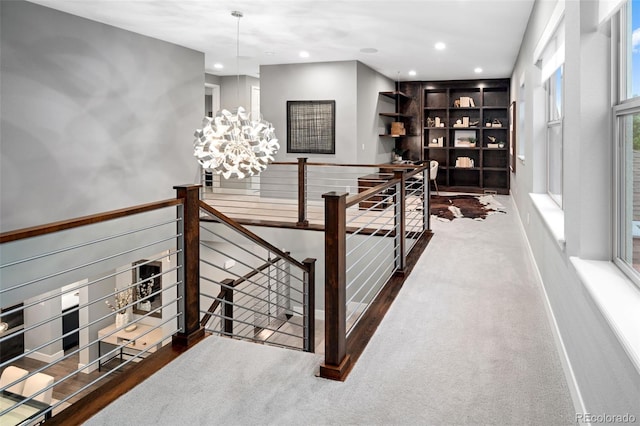 3439 Uinta St, Denver, CO 80238 - corridor with an upstairs landing, recessed lighting, carpet, and a chandelier