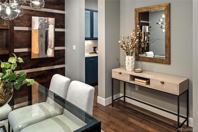 3439 Uinta St, Denver, CO 80238 - dining space with dark wood-type flooring and a chandelier