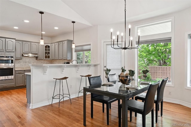 3144 Stevens Cir N, Erie, CO 80516 - dining space featuring a chandelier, light wood finished floors, and recessed lighting