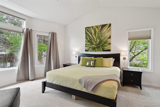 3144 Stevens Cir N, Erie, CO 80516 - bedroom with vaulted ceiling, light colored carpet, and multiple windows