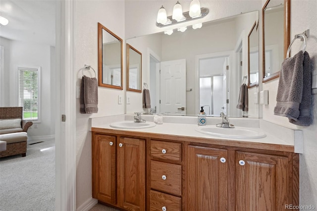 3144 Stevens Cir N, Erie, CO 80516 - full bathroom featuring double vanity and baseboards