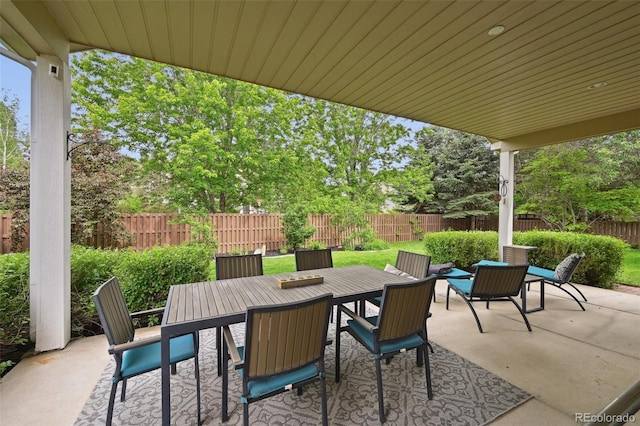 3144 Stevens Cir N, Erie, CO 80516 - fenced backyard featuring outdoor dining space and a patio