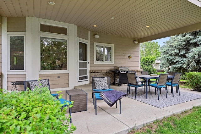 3144 Stevens Cir N, Erie, CO 80516 - view of patio featuring outdoor dining area and a grill