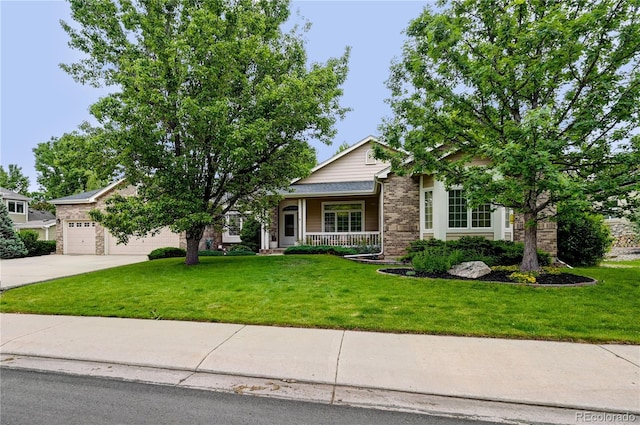 3144 Stevens Cir N, Erie, CO 80516 - view of front facade featuring driveway, a porch, a front lawn, a garage, and brick siding