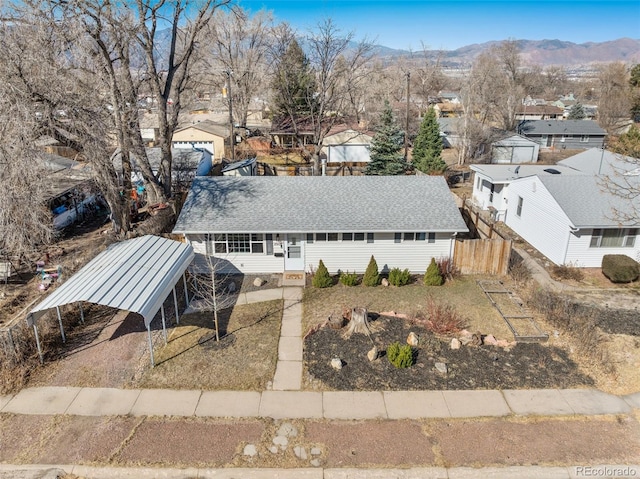 birds eye view of property with a residential view and a mountain view