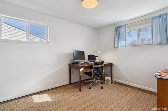 office space with a wealth of natural light and baseboards