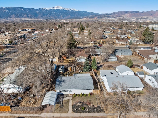 aerial view featuring a mountain view and a residential view