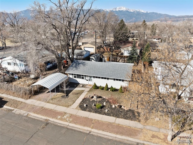 drone / aerial view featuring a mountain view