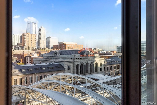 balcony featuring a city view