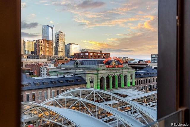 balcony at dusk with a skyline view
