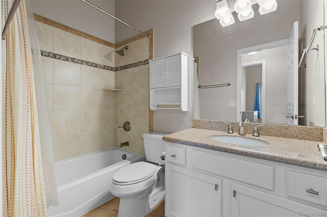 bathroom featuring vanity, toilet, and shower / bath combo with shower curtain