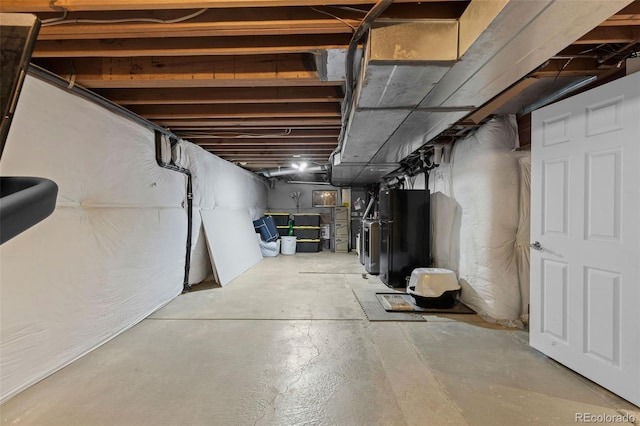 unfinished basement with heating unit