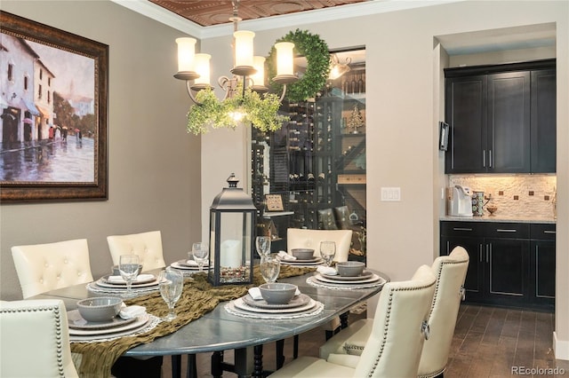 19429 W 88th Dr, Arvada, CO 80007 - dining area featuring dark wood-style floors and crown molding