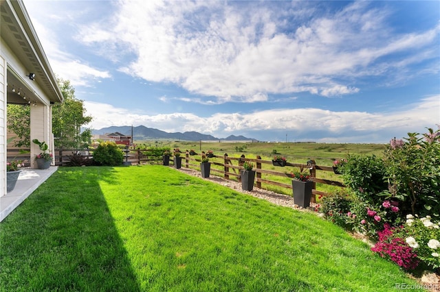 19429 W 88th Dr, Arvada, CO 80007 - view of yard featuring a mountain view