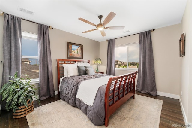19429 W 88th Dr, Arvada, CO 80007 - bedroom with wood finished floors and a ceiling fan