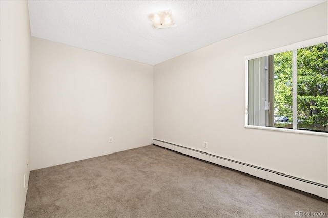 3082 S Wheeling Way Unit 202, Aurora, CO 80014 - carpeted spare room featuring a baseboard heating unit