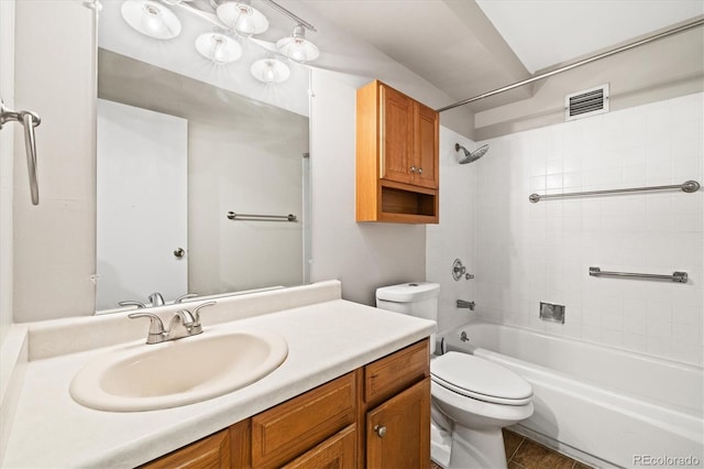 3082 S Wheeling Way Unit 202, Aurora, CO 80014 - bathroom with toilet, vanity, and washtub / shower combination