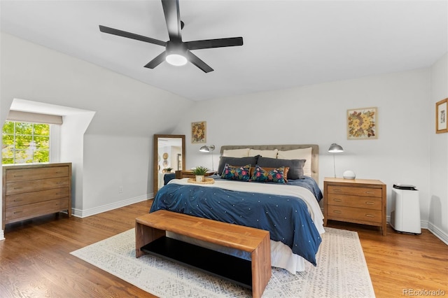 400 Holly St, Denver, CO 80220 - bedroom with wood finished floors, baseboards, lofted ceiling, and ceiling fan