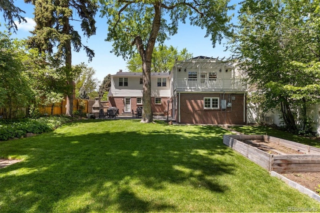 400 Holly St, Denver, CO 80220 - back of property with a vegetable garden, brick siding, a pergola, a patio area, and a chimney