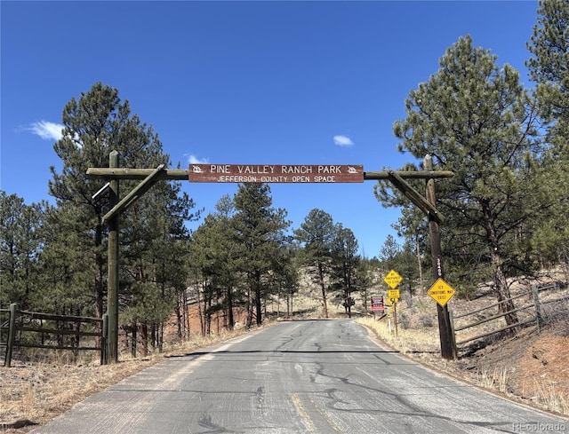 16670 County Road 126, Pine, CO 80470 - view of street with traffic signs and view of wooded area