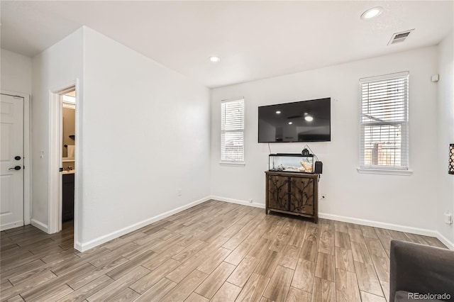 unfurnished living room with light hardwood / wood-style floors