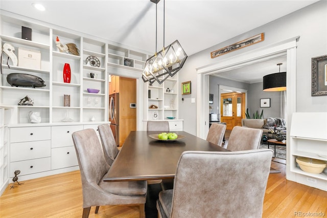 3701 Eliot St, Denver, CO 80211 - dining space with light wood-style flooring and ornamental molding