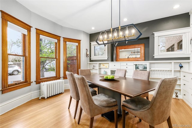 3701 Eliot St, Denver, CO 80211 - dining room featuring radiator, light wood finished floors, a chandelier, and recessed lighting