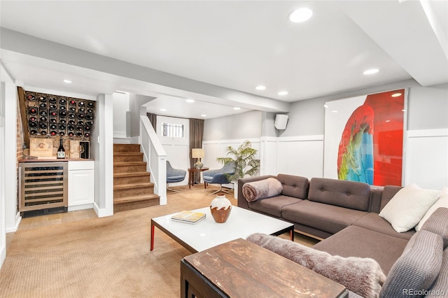 3701 Eliot St, Denver, CO 80211 - living area with wine cooler, a dry bar, stairs, light colored carpet, and recessed lighting