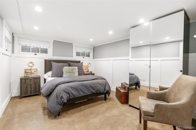3701 Eliot St, Denver, CO 80211 - bedroom with light carpet, a decorative wall, and recessed lighting