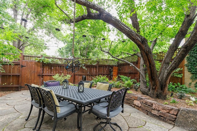 3701 Eliot St, Denver, CO 80211 - fenced backyard featuring outdoor dining space and a patio area
