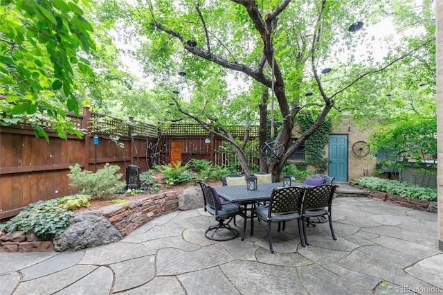 3701 Eliot St, Denver, CO 80211 - fenced backyard with a patio area and outdoor dining space