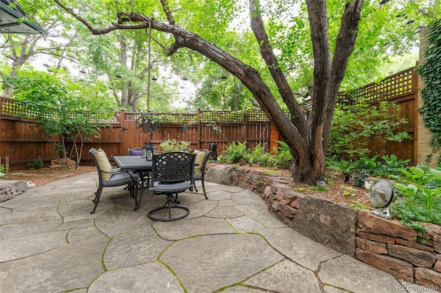 3701 Eliot St, Denver, CO 80211 - fenced backyard featuring a patio and outdoor dining space