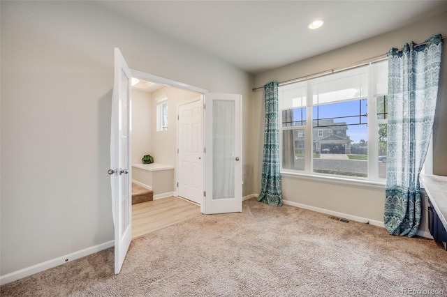 3620 Sandoval St, Brighton, CO 80601 - unfurnished bedroom with carpet floors, french doors, and recessed lighting