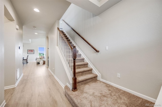 3620 Sandoval St, Brighton, CO 80601 - stairway with wood finished floors and recessed lighting