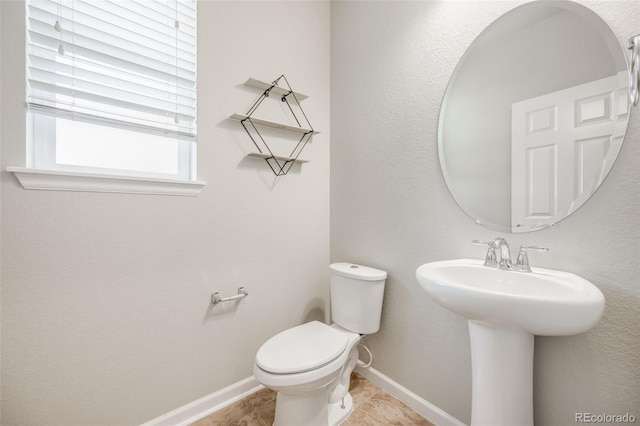 3620 Sandoval St, Brighton, CO 80601 - half bath featuring a sink and tile patterned flooring