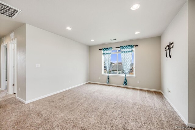 3620 Sandoval St, Brighton, CO 80601 - unfurnished room featuring light colored carpet and recessed lighting