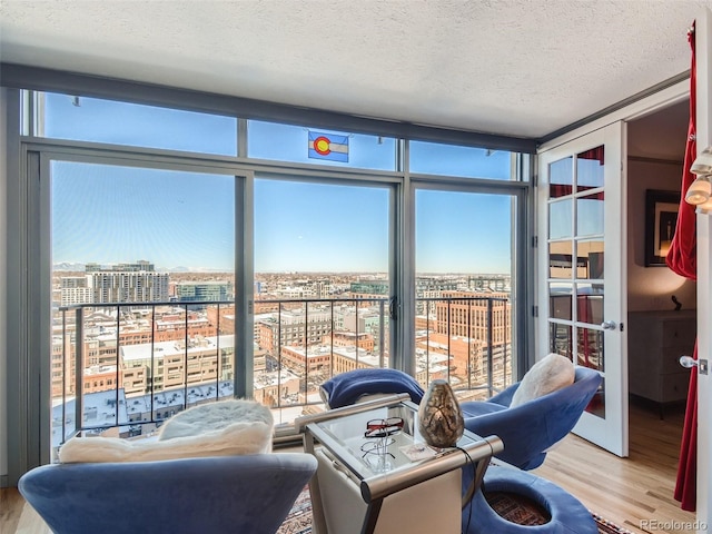 sunroom / solarium with a view of city