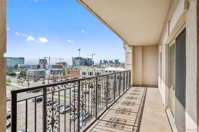 balcony featuring a view of city