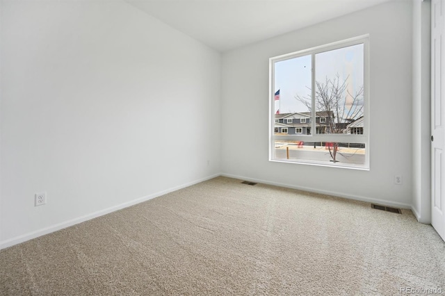 empty room featuring carpet