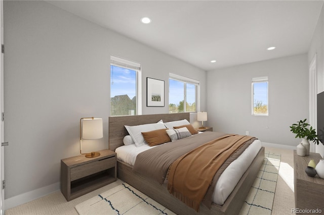 4737 E Iliff Ave, Denver, CO 80222 - bedroom featuring multiple windows, recessed lighting, and light carpet