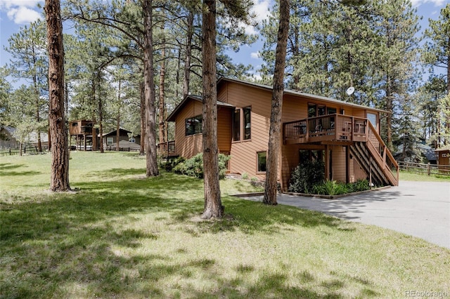 29101 Drexel Spur, Evergreen, CO 80439 - view of front of house with a deck and stairs