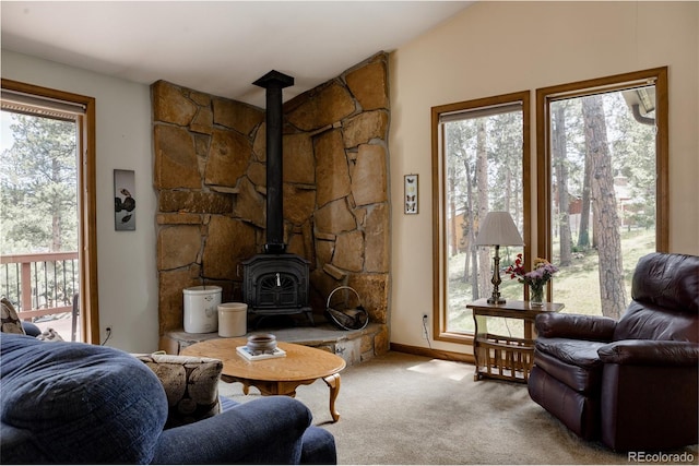 29101 Drexel Spur, Evergreen, CO 80439 - carpeted living area featuring a wood stove