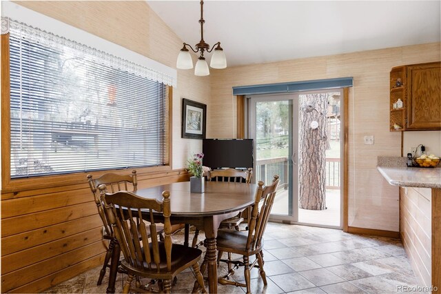 29101 Drexel Spur, Evergreen, CO 80439 - dining space featuring a chandelier and vaulted ceiling