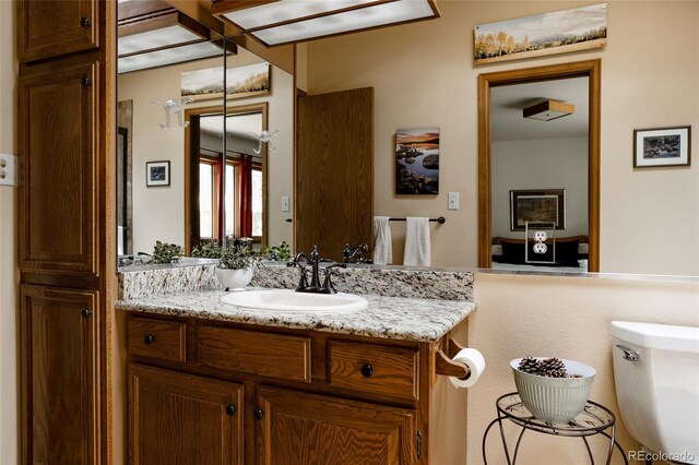 29101 Drexel Spur, Evergreen, CO 80439 - bathroom featuring vanity and toilet